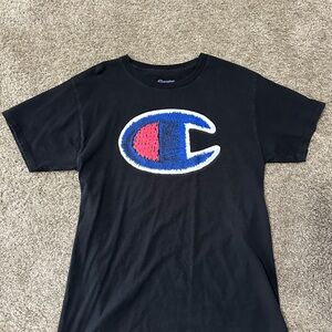 Men’s Champion Black Tee with Blue and Red Emblem